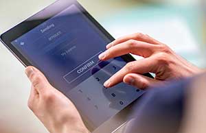 User logging in a mobile banking app User logging in a mobile banking app