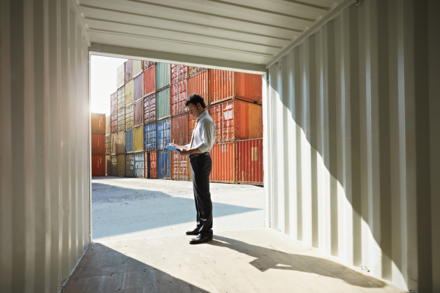 Women control loading containers Women control loading containers