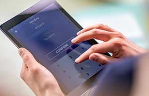 User logging in a mobile banking app User logging in a mobile banking app